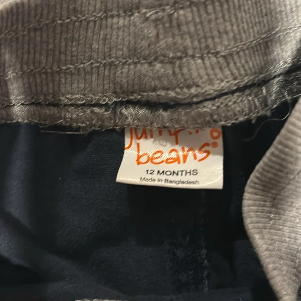 Jumping beans shorts size 12 months- navy and gray with string tie in front